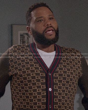 WornOnTV: Andre’s Gucci logo cardigan on Black